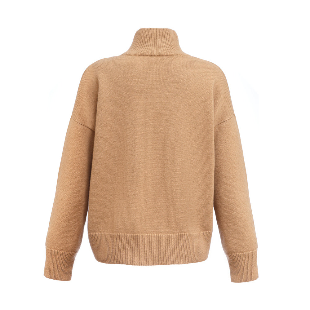 
                  
                    Wool Turtleneck Sweater
                  
                